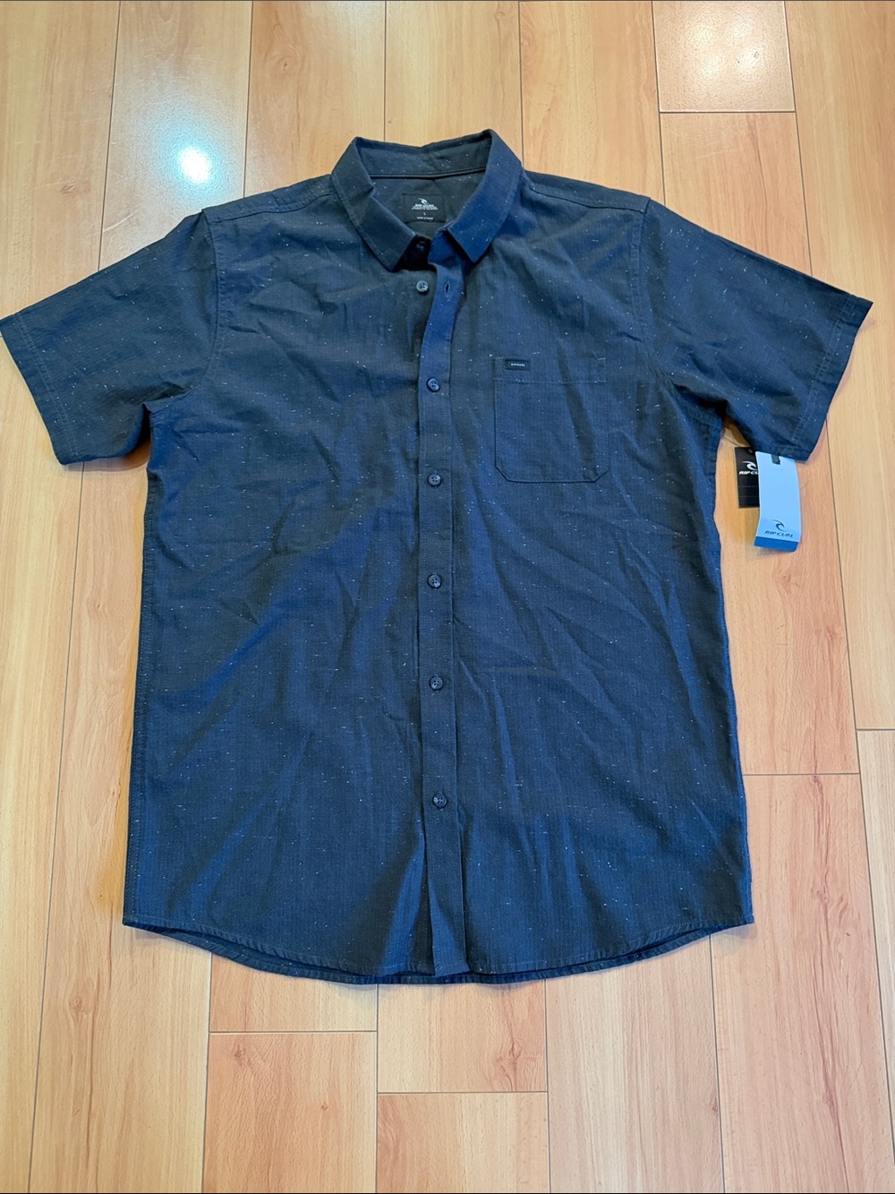 Rip Curl Men's Black Short-Sleeve Button-Down Shirt with Subtle Speckle